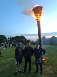 Three men and a beacon