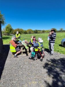 people taking a break in the sunshine